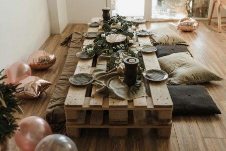 low table made of pallets and pillows